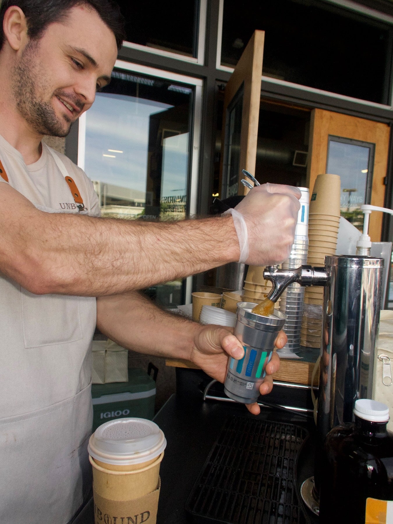 Cold brew on tap being poured, Unbound Brews cold brew keg ready to serve